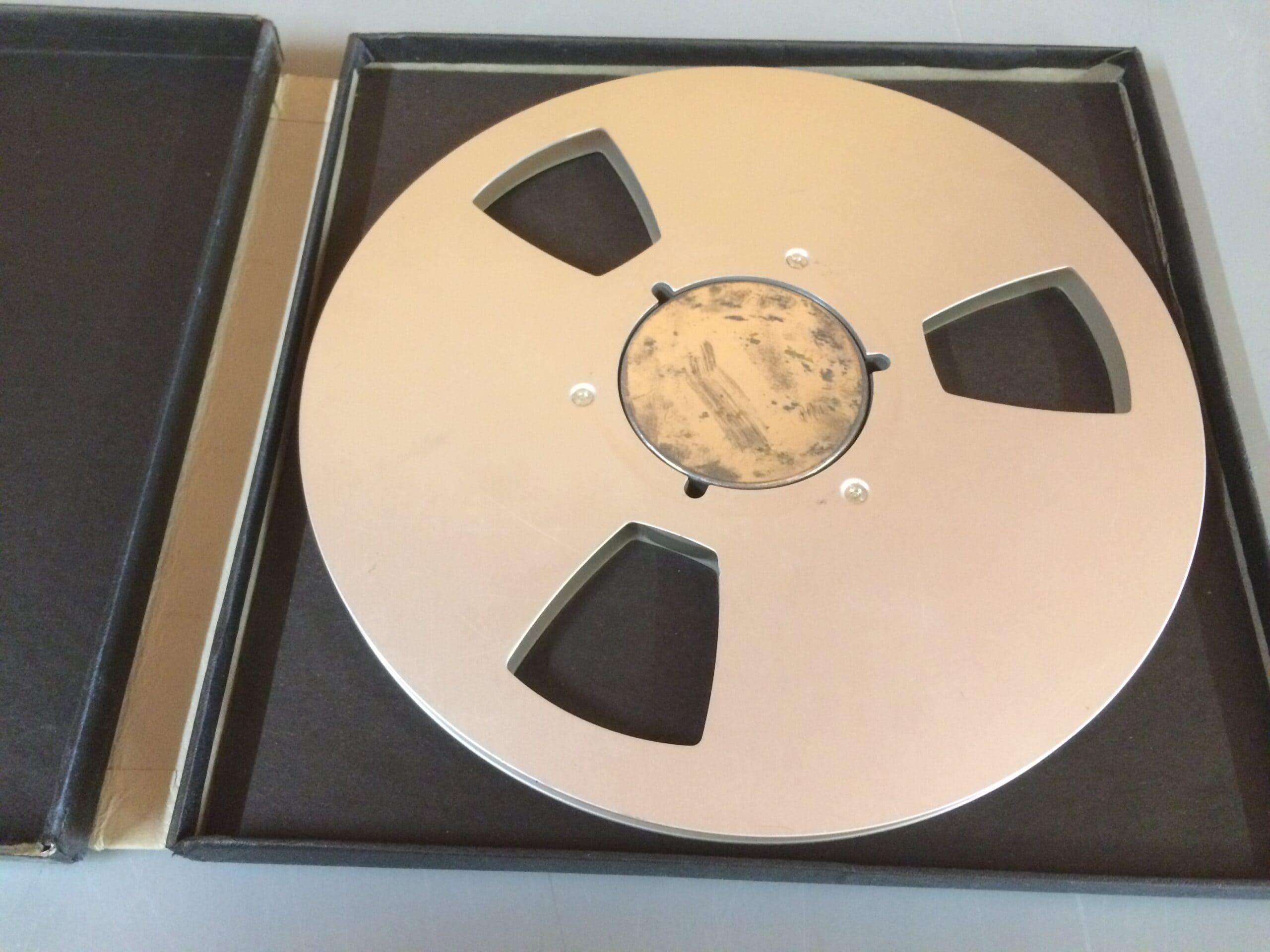 thumbnail image 2 of Ampex 10" Empty Metal Tape Reel - 1/4", Classic 3-Window Silver Design With Box 2 of 13